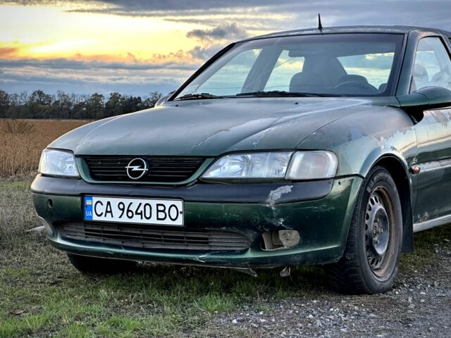 Зеленый Опель Вектра, объемом двигателя 1.8 л и пробегом 344 тыс. км за 1650 $, фото 7 на Automoto.ua