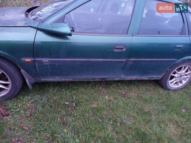 Зеленый Опель Вектра, объемом двигателя 1.8 л и пробегом 319 тыс. км за 1000 $, фото 14 на Automoto.ua