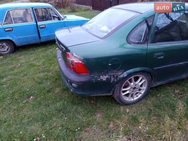 Зеленый Опель Вектра, объемом двигателя 1.8 л и пробегом 319 тыс. км за 1000 $, фото 8 на Automoto.ua