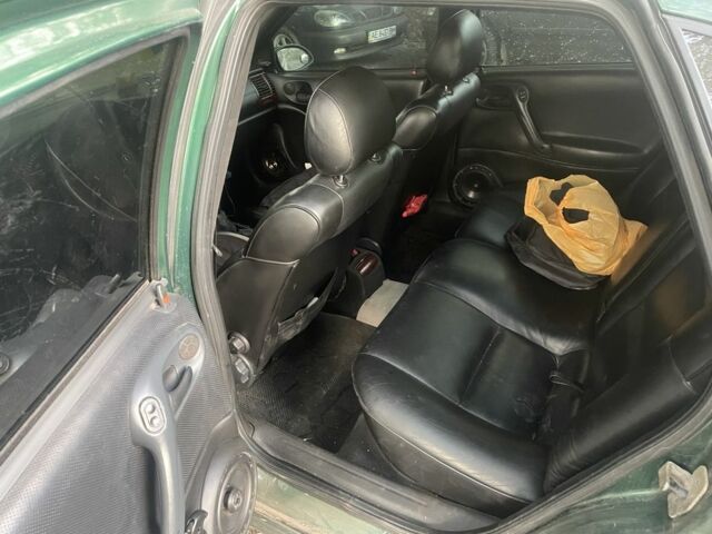 Зеленый Опель Вектра, объемом двигателя 2 л и пробегом 1000 тыс. км за 1668 $, фото 7 на Automoto.ua