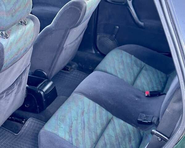 Зеленый Опель Вектра, объемом двигателя 1.8 л и пробегом 344 тыс. км за 1650 $, фото 21 на Automoto.ua