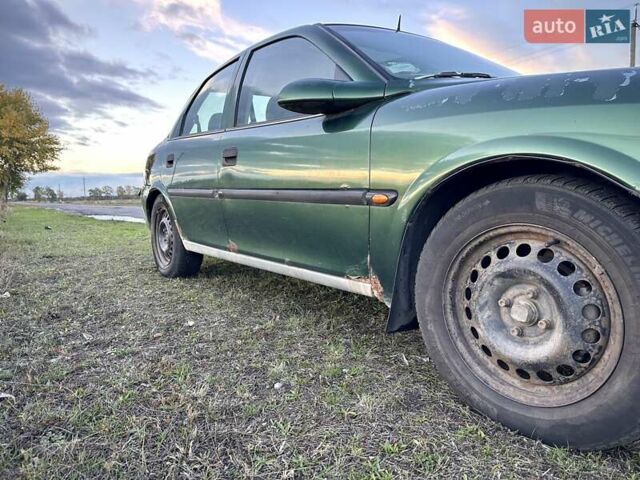 Зеленый Опель Вектра, объемом двигателя 1.8 л и пробегом 344 тыс. км за 1650 $, фото 10 на Automoto.ua