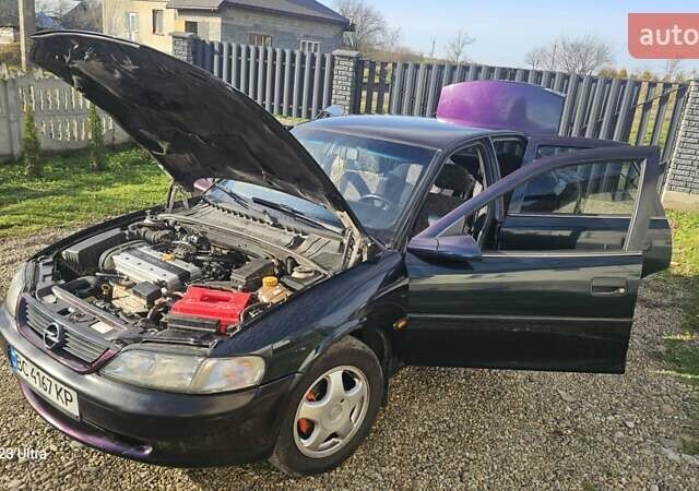 Зеленый Опель Вектра, объемом двигателя 1.8 л и пробегом 251 тыс. км за 2250 $, фото 17 на Automoto.ua