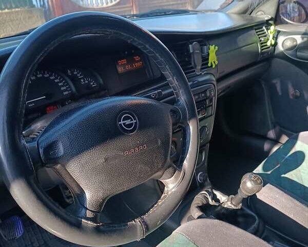 Зеленый Опель Вектра, объемом двигателя 1.8 л и пробегом 340 тыс. км за 2700 $, фото 9 на Automoto.ua