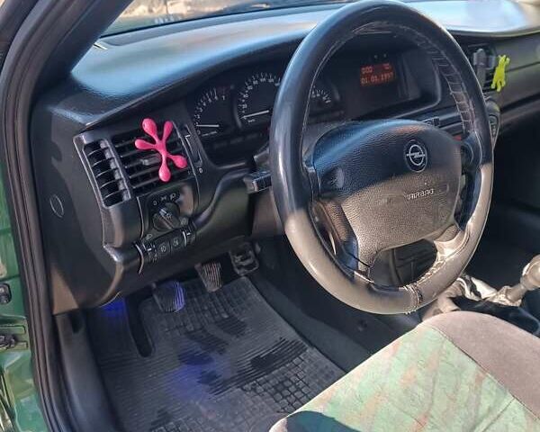 Зеленый Опель Вектра, объемом двигателя 1.8 л и пробегом 340 тыс. км за 2700 $, фото 13 на Automoto.ua