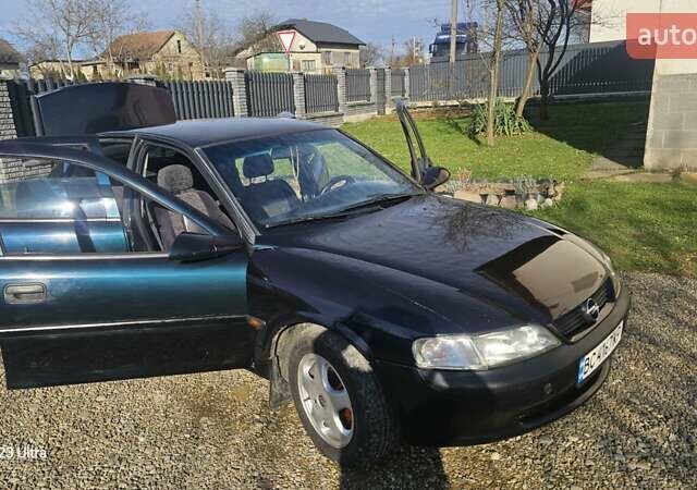 Зеленый Опель Вектра, объемом двигателя 1.8 л и пробегом 251 тыс. км за 2250 $, фото 19 на Automoto.ua