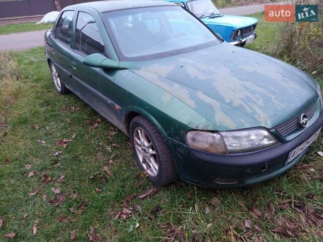 Зеленый Опель Вектра, объемом двигателя 1.8 л и пробегом 319 тыс. км за 1000 $, фото 10 на Automoto.ua