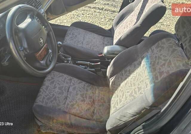 Зеленый Опель Вектра, объемом двигателя 1.8 л и пробегом 251 тыс. км за 2250 $, фото 35 на Automoto.ua