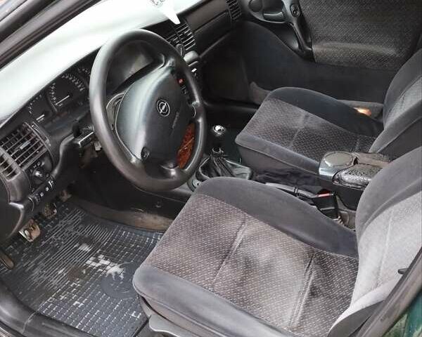 Зелений Опель Вектра, об'ємом двигуна 2 л та пробігом 443 тис. км за 2850 $, фото 6 на Automoto.ua