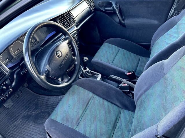 Зеленый Опель Вектра, объемом двигателя 1.8 л и пробегом 344 тыс. км за 1650 $, фото 15 на Automoto.ua