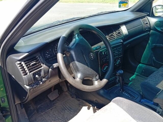 Зеленый Опель Вектра, объемом двигателя 1 л и пробегом 1000 тыс. км за 2200 $, фото 3 на Automoto.ua