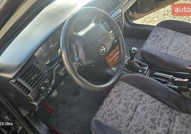 Зеленый Опель Вектра, объемом двигателя 1.8 л и пробегом 251 тыс. км за 2250 $, фото 36 на Automoto.ua