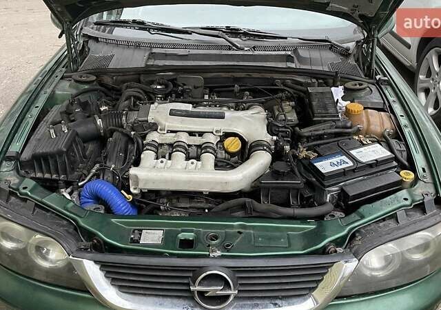 Зеленый Опель Вектра, объемом двигателя 2.5 л и пробегом 365 тыс. км за 2650 $, фото 7 на Automoto.ua