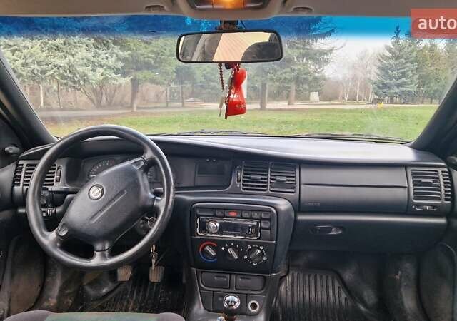 Зелений Опель Вектра, об'ємом двигуна 1.6 л та пробігом 280 тис. км за 1400 $, фото 7 на Automoto.ua
