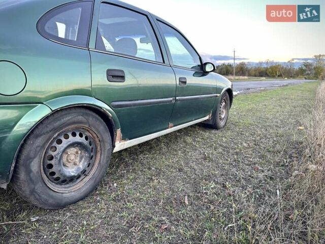 Зеленый Опель Вектра, объемом двигателя 1.8 л и пробегом 344 тыс. км за 1650 $, фото 13 на Automoto.ua