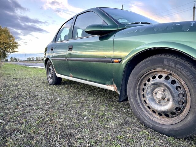 Зеленый Опель Вектра, объемом двигателя 1.8 л и пробегом 344 тыс. км за 1650 $, фото 10 на Automoto.ua