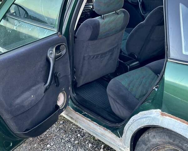 Зеленый Опель Вектра, объемом двигателя 1.8 л и пробегом 344 тыс. км за 1650 $, фото 22 на Automoto.ua