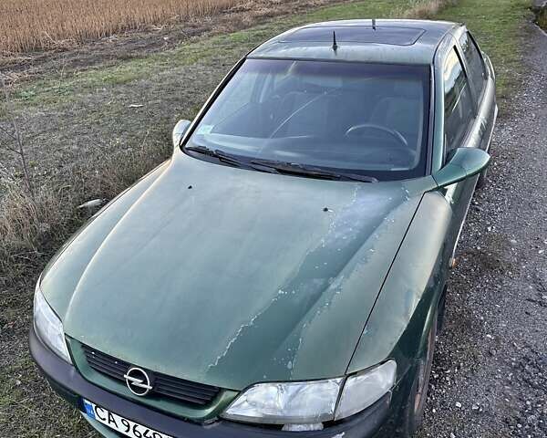 Зеленый Опель Вектра, объемом двигателя 1.8 л и пробегом 344 тыс. км за 1650 $, фото 11 на Automoto.ua
