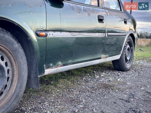 Зеленый Опель Вектра, объемом двигателя 1.8 л и пробегом 344 тыс. км за 1650 $, фото 8 на Automoto.ua