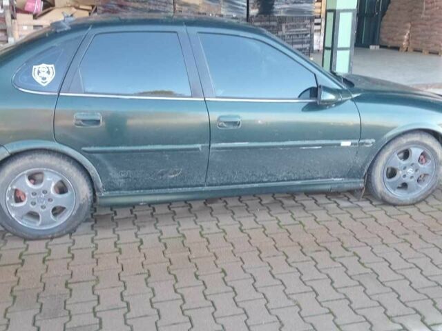 Зелений Опель Вектра, об'ємом двигуна 2 л та пробігом 400 тис. км за 1500 $, фото 1 на Automoto.ua