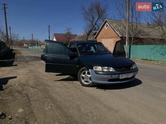 Зеленый Опель Вектра, объемом двигателя 1.6 л и пробегом 258 тыс. км за 1650 $, фото 4 на Automoto.ua