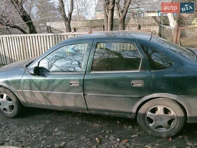 Зеленый Опель Вектра, объемом двигателя 2 л и пробегом 350 тыс. км за 1900 $, фото 1 на Automoto.ua