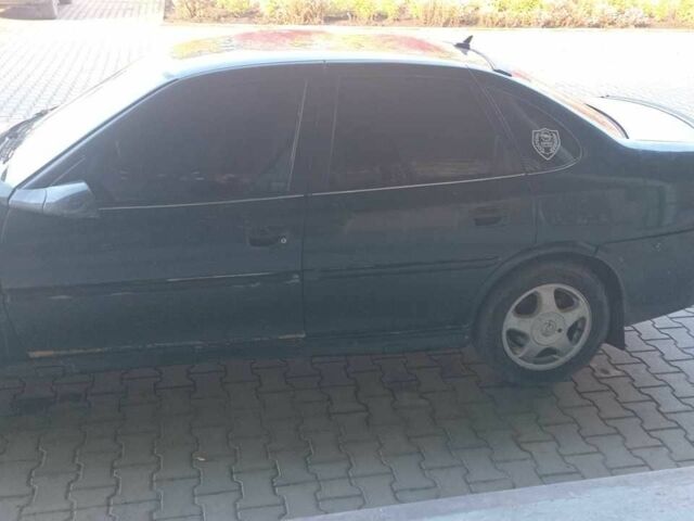 Зелений Опель Вектра, об'ємом двигуна 2 л та пробігом 400 тис. км за 850 $, фото 1 на Automoto.ua