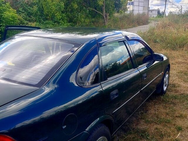 Зеленый Опель Вектра, объемом двигателя 1.8 л и пробегом 187 тыс. км за 2300 $, фото 4 на Automoto.ua