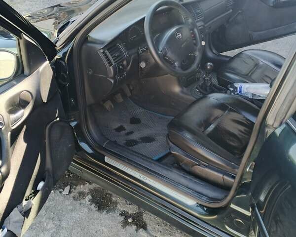 Зелений Опель Вектра, об'ємом двигуна 1.6 л та пробігом 363 тис. км за 3350 $, фото 4 на Automoto.ua