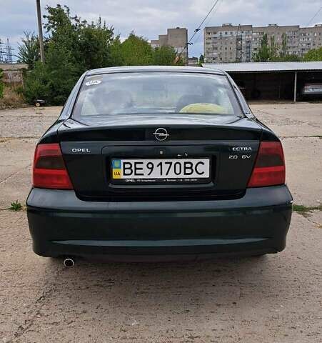 Зеленый Опель Вектра, объемом двигателя 2 л и пробегом 313 тыс. км за 3300 $, фото 1 на Automoto.ua