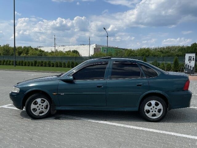 Зелений Опель Вектра, об'ємом двигуна 1.8 л та пробігом 240 тис. км за 2350 $, фото 10 на Automoto.ua
