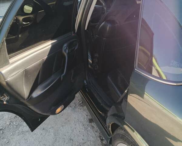 Зелений Опель Вектра, об'ємом двигуна 1.6 л та пробігом 363 тис. км за 3350 $, фото 5 на Automoto.ua