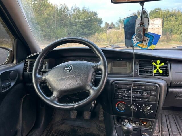 Зелений Опель Вектра, об'ємом двигуна 2 л та пробігом 400 тис. км за 1000 $, фото 8 на Automoto.ua