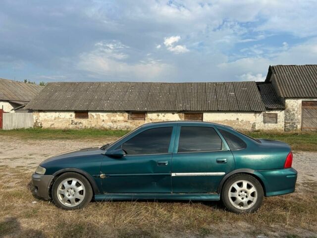 Зелений Опель Вектра, об'ємом двигуна 2 л та пробігом 400 тис. км за 1000 $, фото 6 на Automoto.ua