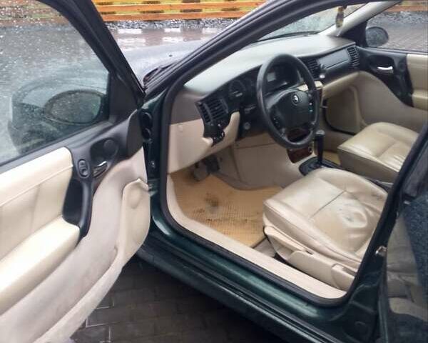 Зеленый Опель Вектра, объемом двигателя 2.2 л и пробегом 237 тыс. км за 2999 $, фото 17 на Automoto.ua