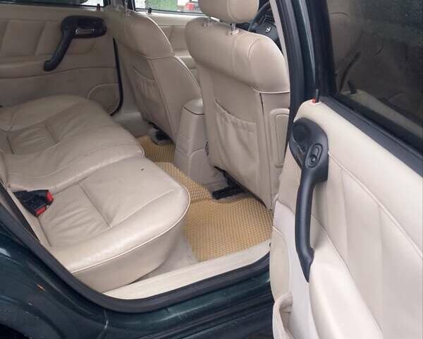 Зеленый Опель Вектра, объемом двигателя 2.2 л и пробегом 237 тыс. км за 2999 $, фото 11 на Automoto.ua