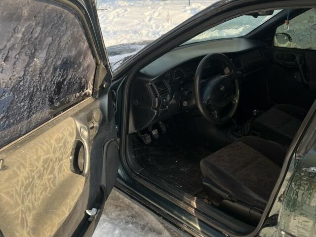 Зелений Опель Вектра, об'ємом двигуна 1.6 л та пробігом 200 тис. км за 1600 $, фото 5 на Automoto.ua