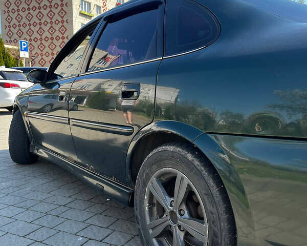 Зеленый Опель Вектра, объемом двигателя 1.8 л и пробегом 419 тыс. км за 2500 $, фото 2 на Automoto.ua