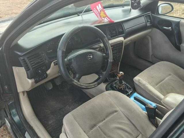 Зеленый Опель Вектра, объемом двигателя 2 л и пробегом 280 тыс. км за 1000 $, фото 2 на Automoto.ua