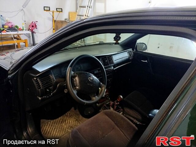 Зелений Опель Вектра, об'ємом двигуна 2 л та пробігом 370 тис. км за 2500 $, фото 7 на Automoto.ua