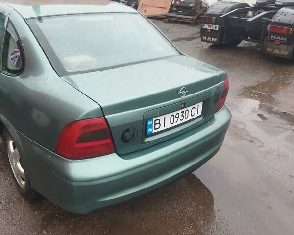 Зеленый Опель Вектра, объемом двигателя 2 л и пробегом 370 тыс. км за 2100 $, фото 2 на Automoto.ua