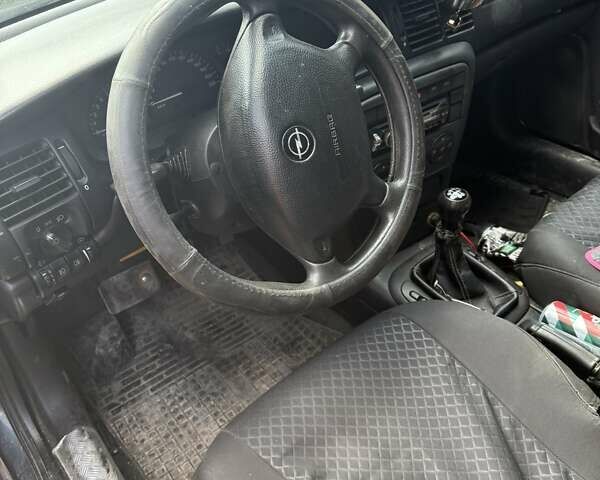 Зеленый Опель Вектра, объемом двигателя 1.8 л и пробегом 225 тыс. км за 1200 $, фото 10 на Automoto.ua