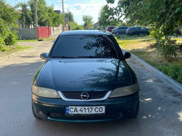 Зеленый Опель Вектра, объемом двигателя 2 л и пробегом 164 тыс. км за 1350 $, фото 1 на Automoto.ua