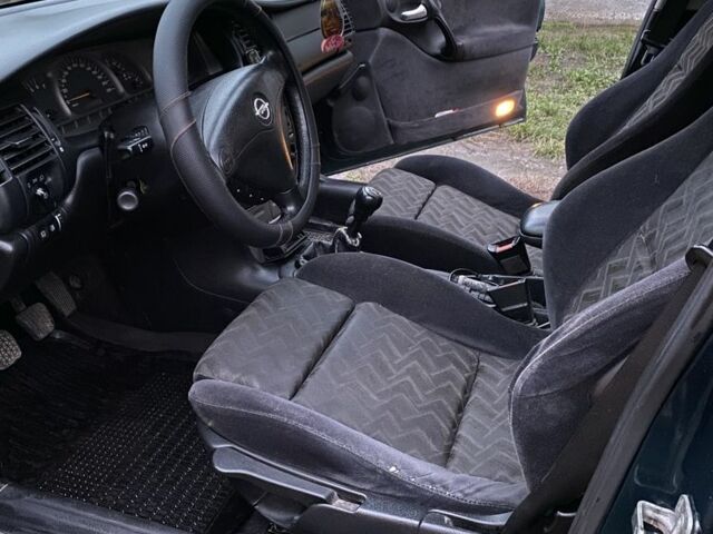 Зеленый Опель Вектра, объемом двигателя 1.8 л и пробегом 350 тыс. км за 1550 $, фото 7 на Automoto.ua