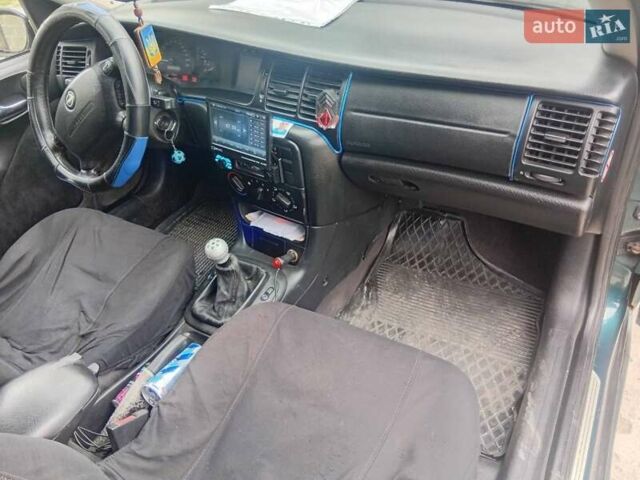 Зеленый Опель Вектра, объемом двигателя 1.6 л и пробегом 88 тыс. км за 2600 $, фото 4 на Automoto.ua