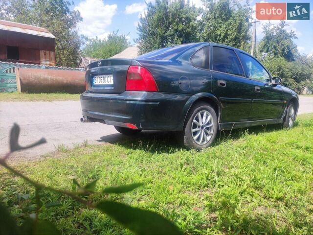 Зеленый Опель Вектра, объемом двигателя 2 л и пробегом 208 тыс. км за 2700 $, фото 5 на Automoto.ua
