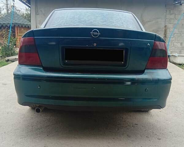 Зеленый Опель Вектра, объемом двигателя 1.6 л и пробегом 88 тыс. км за 2600 $, фото 2 на Automoto.ua
