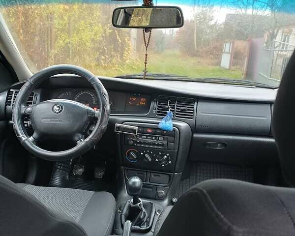 Зелений Опель Вектра, об'ємом двигуна 2.2 л та пробігом 212 тис. км за 3800 $, фото 7 на Automoto.ua