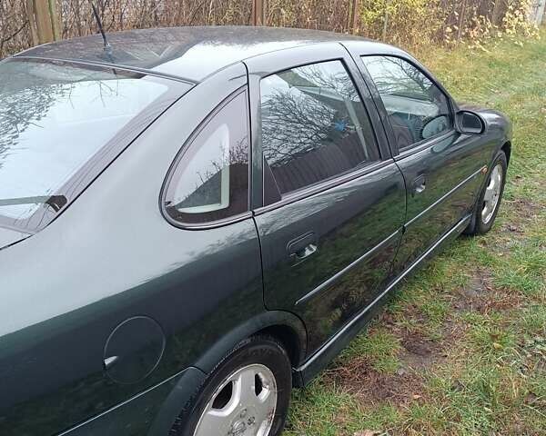 Зелений Опель Вектра, об'ємом двигуна 2.2 л та пробігом 212 тис. км за 3800 $, фото 14 на Automoto.ua