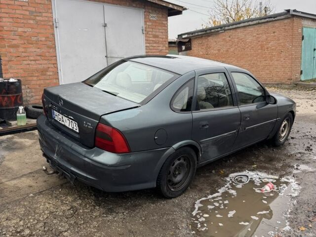 Зелений Опель Вектра, об'ємом двигуна 2 л та пробігом 300 тис. км за 900 $, фото 4 на Automoto.ua